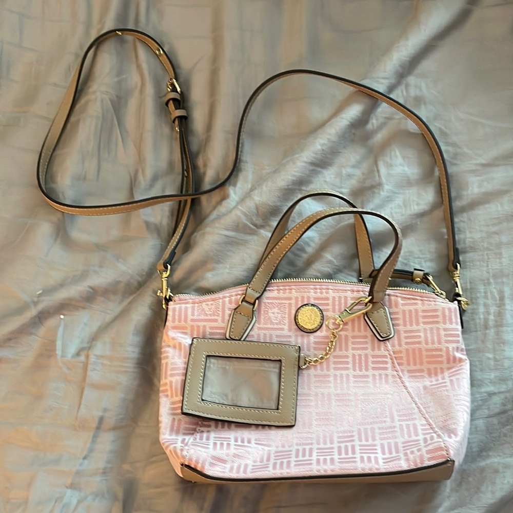 Never used Anne Klein has a tear pink and tan shoulder bag